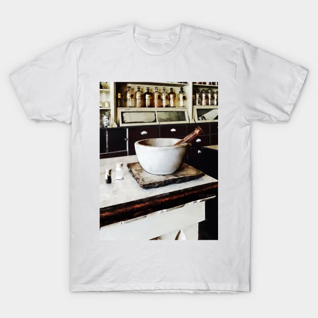 Pharmacy - Mortar and Pestle in Apothecary T-Shirt by SusanSavad